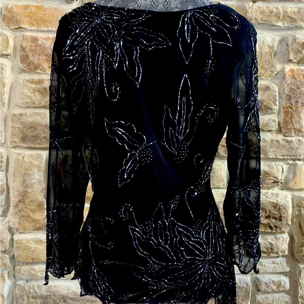 Vintage fit size medium to large. Hand beaded. See-through sleeves.  Beautiful.